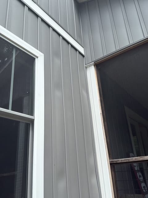 Vertical siding and door frame inspection