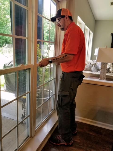 Dean pointing at structural element