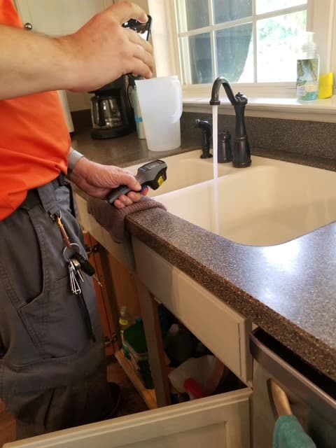 Brother inspecting finished home window